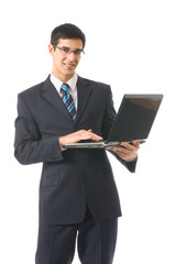 Businessman with laptop, isolated on white