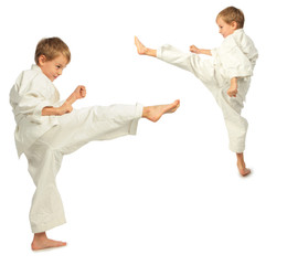 Karate boys kick by foot