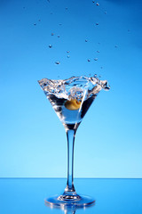 Splash martini on blue