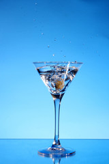 Splash martini on blue