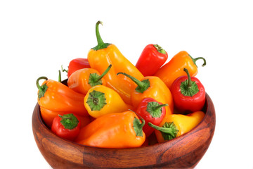 Red and Yellow Peppers in a Wood Bowl
