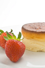 cheesecake with fresh strawberries and blackberry jam