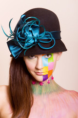 Naklejka premium Woman in makeup and hairstyle