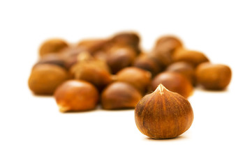 Many chestnuts isolated on the white background