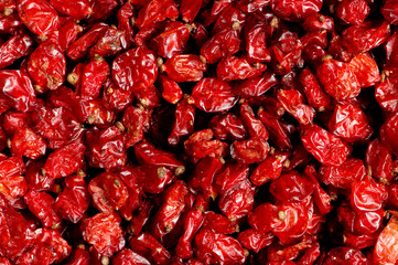 Background made of red dried raisins