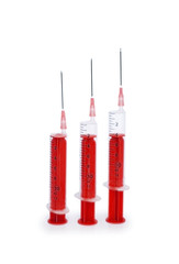 Three syringes isolated on the white background