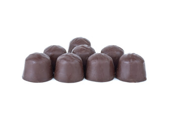 Some round chocolate candies
