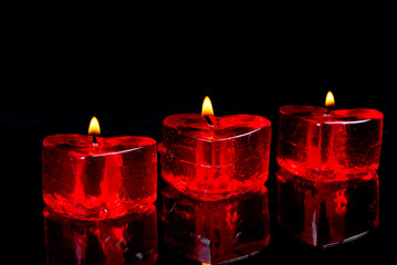 Candle in the form of heart.