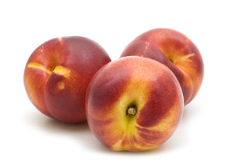 fresh nectarines on white background.