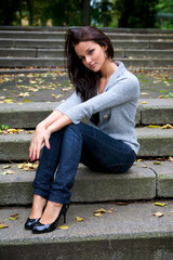 Beautiful girl in a autumn park