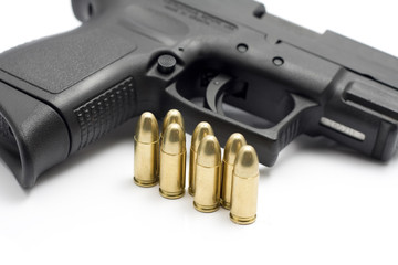 pistol and bullets isolated