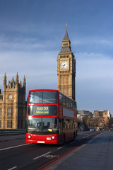 Houses of Parliament with red bus in London