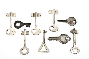 set of old keys isolated on white background