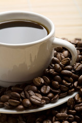 cup of coffee and coffee beans