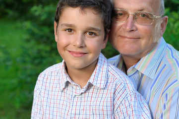Fototapeta premium Portrait of grandfather and kid