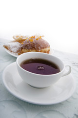 donut and cup of tea