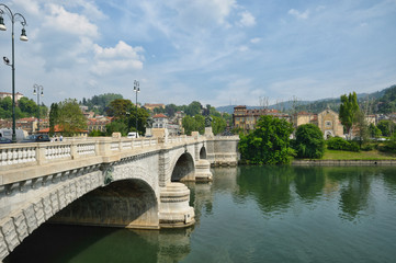 Naklejka premium bridge in turin through river Po