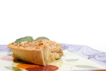 Apple pie slice with kiwi