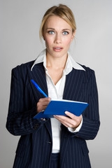 Shocked Woman Writing Checks