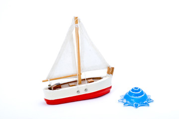 Toy boat and shell