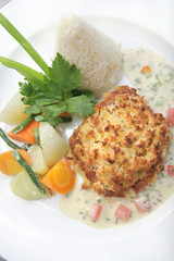 pan seared barracuda steak in bread crumb