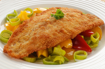 Fried fish fillet with vegetables