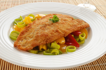 Fried fish fillet with vegetables