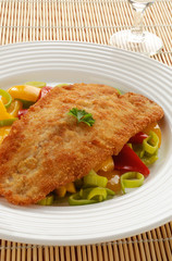 Fried fish fillet with vegetables