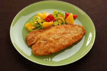 Fried fish fillet with vegetables