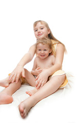 two sisters isolated on white