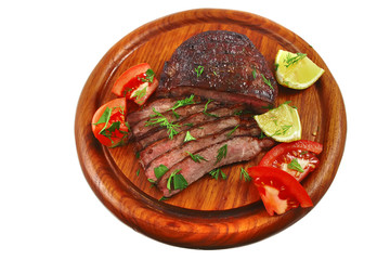 roast beef meat slices on wood plate