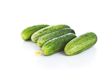 Fresh cucumbers isolated over white