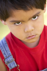 Obraz premium Portrait Of Boy Frowning