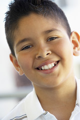 Naklejka premium Portrait Of Boy Smiling