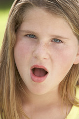 Portrait Of Girl Looking Shocked