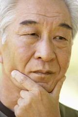 Portrait Of Senior Man Looking Thoughtful