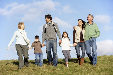 Family Walking In The Park