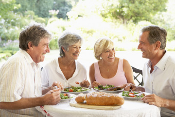 Friends Eating An Al Fresco Lunch