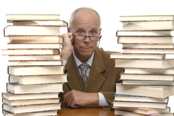 Mature man with books isolated in white