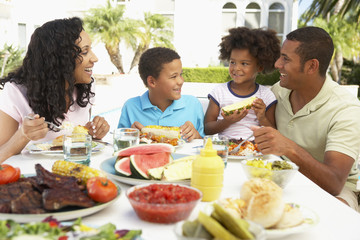Family Eating An Al Fresco Meal