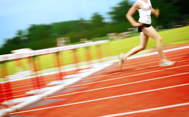 Runner in a hurdle race