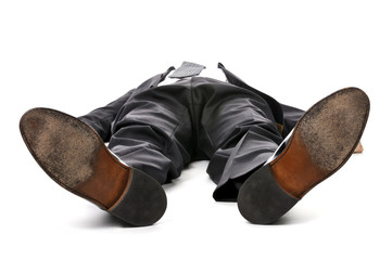 Businessman laying down on white background