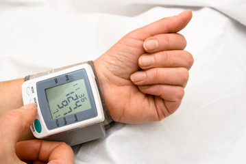 Process of blood pressure examination.