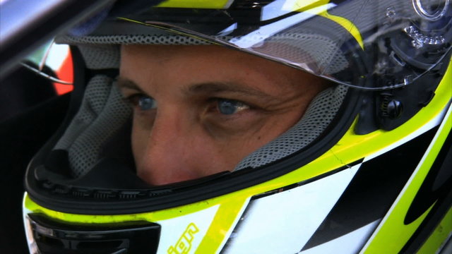 Concentrated glance of a racing driver