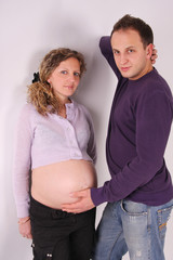 Fototapeta premium Pregnant woman with the husband 27