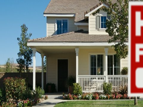 Foreclosure Home For Sale Sign and House