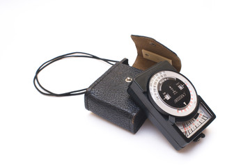 Vintage photo light meter isolated on white