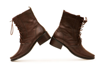 Brown boots isolated on the white background