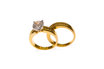 Two wedding rings - selective focus at the lower part