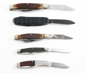 Assorted old pocket knifes open
